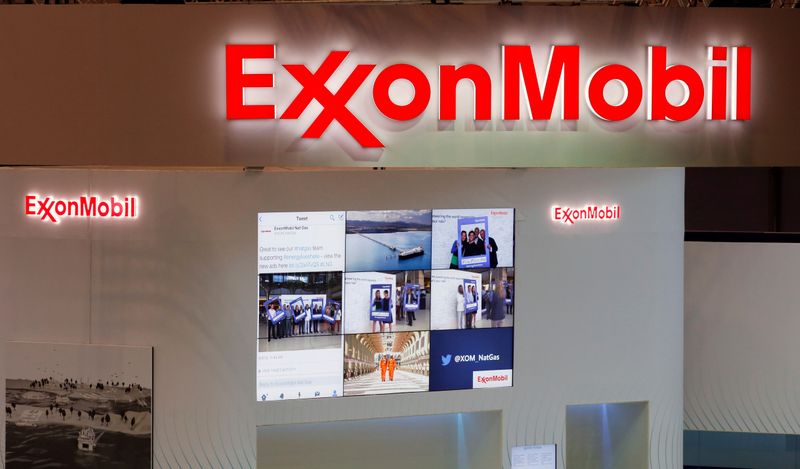 © Reuters. FILE PHOTO: Logos of ExxonMobil are seen in its booth at Gastech, the world's biggest expo for the gas industry, in Chiba