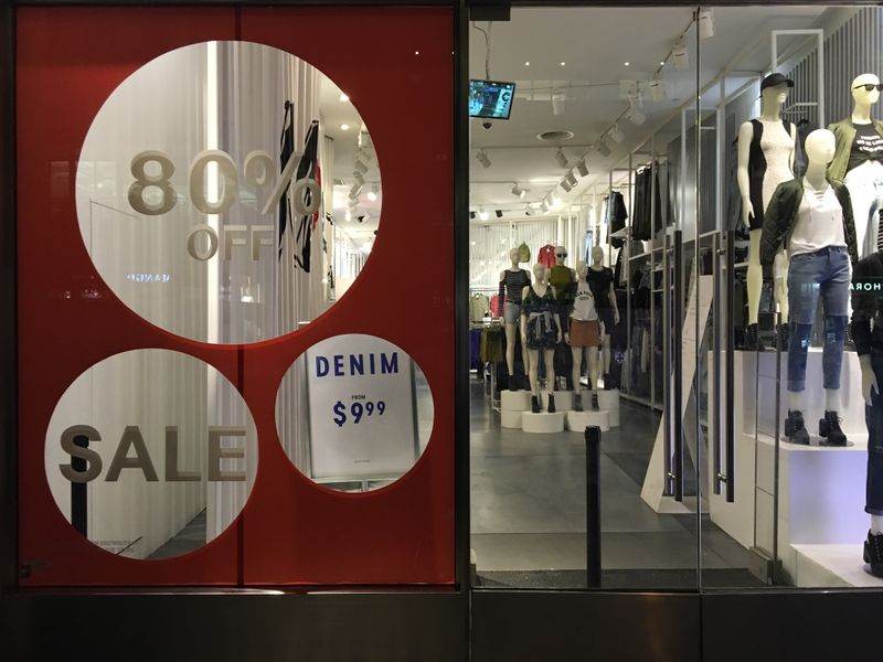© Reuters. An H&M store has sale signs in the window in New York City
