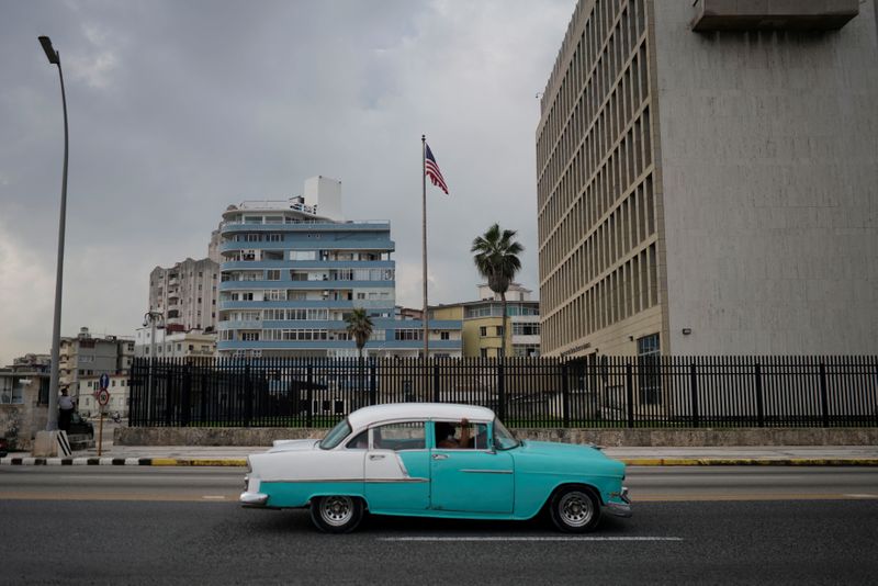 &copy; Reuters. A vintage car passes by the U.S. Embassy in Havana