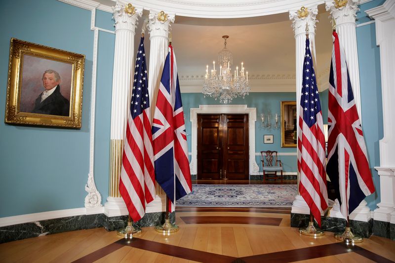 &copy; Reuters. The flags of the United States and the United Kingdom stand after bi-lateral photo between U.S. Secretary of State Rex Tillerson and British Foreign Minister Boris Johnson was cancelled at the State Department in Washington