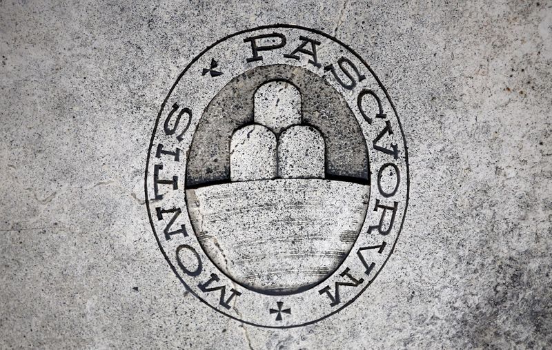 &copy; Reuters. FILE PHOTO: A logo of Monte dei Paschi di Siena bank is seen on the ground in downtown Siena