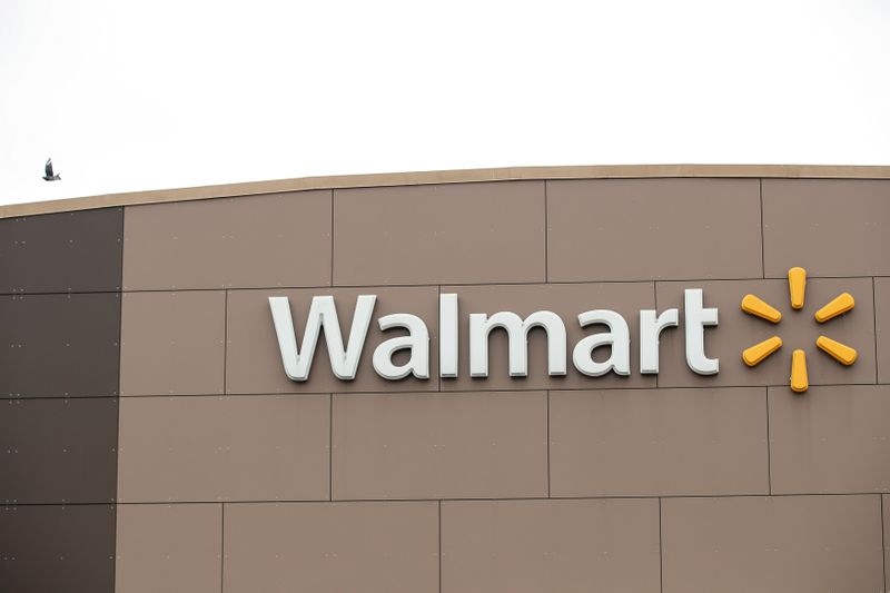 Â© Reuters. FILE PHOTO: Walmart's logo is seen outside one of the stores in Chicago