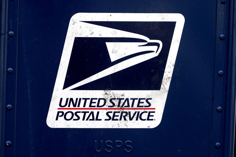 &copy; Reuters. A U.S. Postal Service (USPS) logo is pictured on a mail box