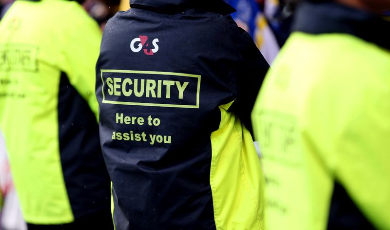 &copy; Reuters. FILE PHOTO: Security staff in G4S jackets at the Challenge Cup semi-final between Huddersfield Giants and Warrington Wolves