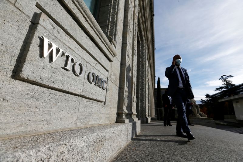 &copy; Reuters. A delegate arrives before a meeting at the World Trade Organization (WTO) in Geneva