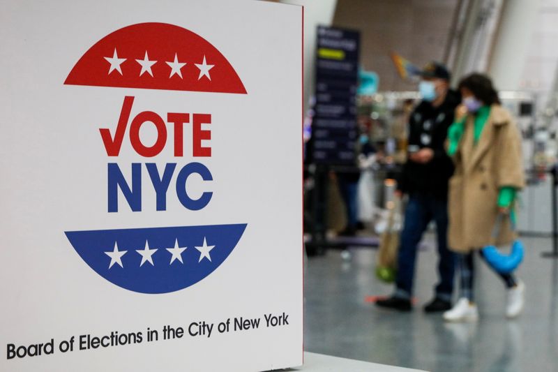 &copy; Reuters. Voters wait in line to cast their ballots in Brooklyn, New York