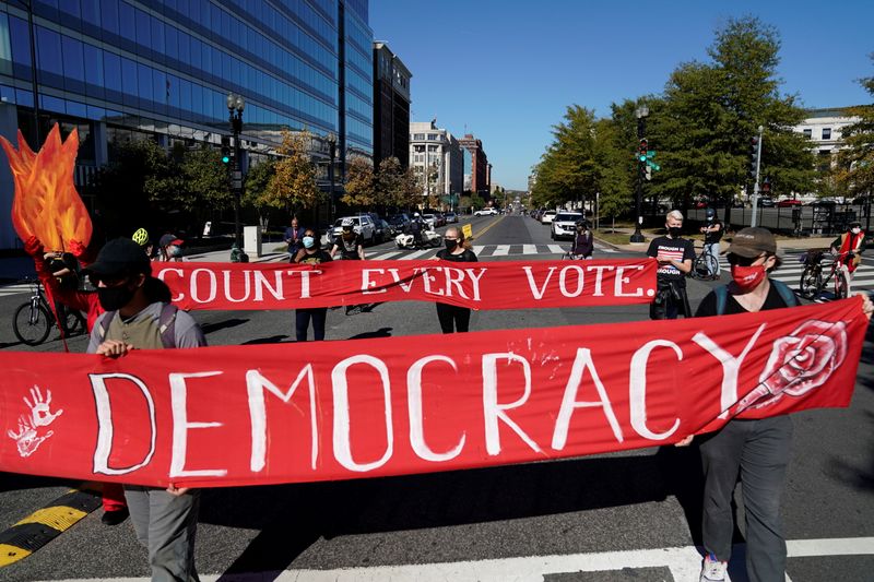 &copy; Reuters. Activists take part in a protest led by shutdownDC the day after the 2020 U.S. presidential election in Washington