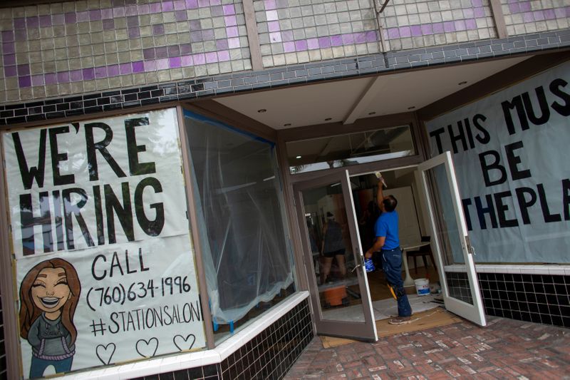 &copy; Reuters. FILE PHOTO: A new business advertises for workers as it prepares to open up during the outbreak of the coronavirus disease in California,