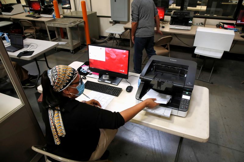 &copy; Reuters. A county election worker tabulates ballots at the Clark County Election Center in North Las Vegas