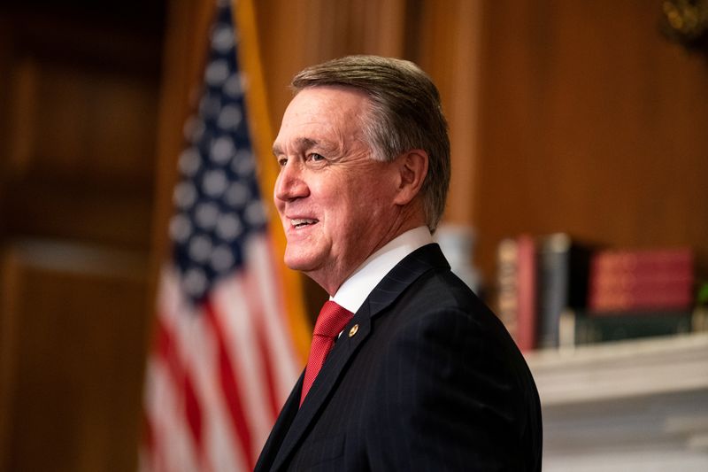 &copy; Reuters. U.S.  Senator David Perdue (R-GA)  meets with Judge Amy Coney Barrett on Capitol Hill in Washington