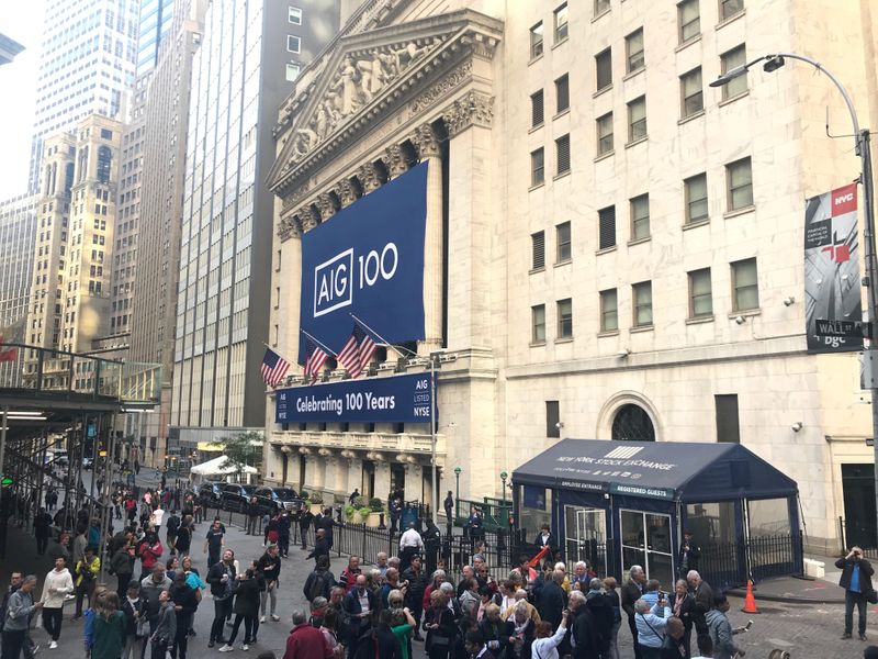 &copy; Reuters. FILE PHOTO: Banners commemorating the 100th anniversary of American International Group Inc. adorn the New York Stock Exchange