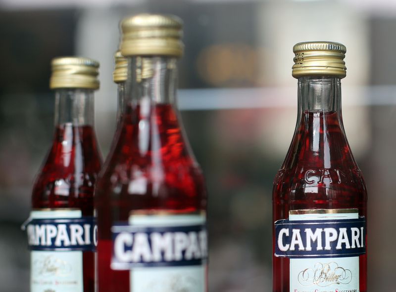 &copy; Reuters. FILE PHOTO: Campari&apos;s mignon bottles are is seen in a window of &quot;The Camparino&quot;  bar historically known as the bar of the Campari brand downtown Milan