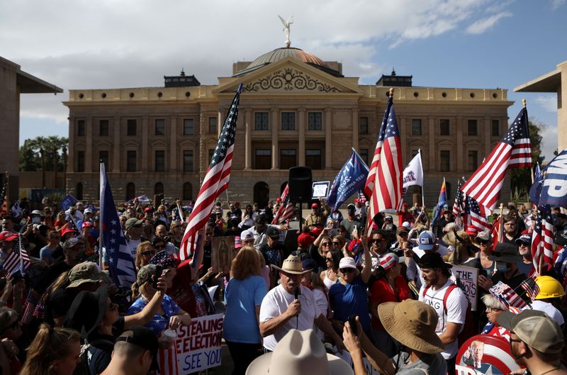 &copy; Reuters. Supporters of U.S. President Donald Trump gather at a &quot;Stop the Steal&quot; protest after the 2020 U.S. presidential election was called for Democratic candidate Joe Biden, in Phoenix