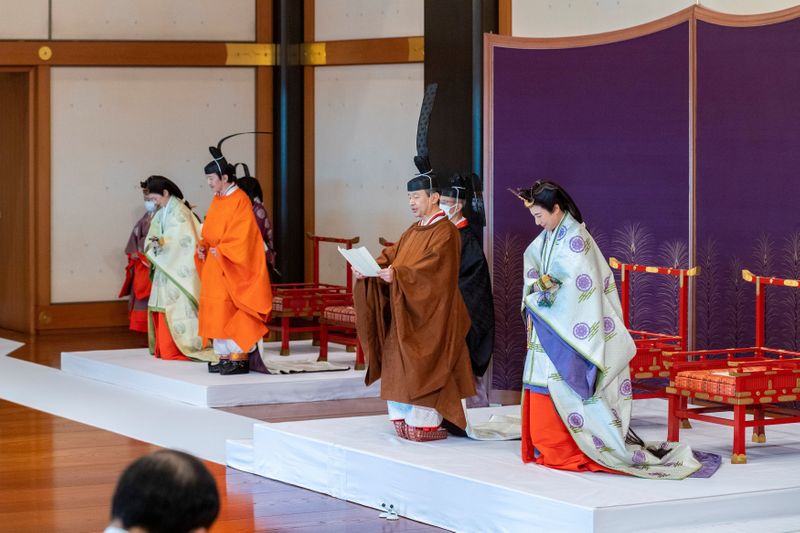 &copy; Reuters. Handout photo shows Japan&apos;s Crown Prince Akishino and Crown Princess Kiko, attend a ceremony for formally proclaims Crown Prince Akishino is the first in line as heir to the throne, in Tokyo