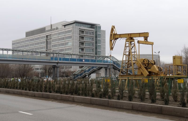 &copy; Reuters. View shows oil well pump jack set as installation in front of Tengizchevroil LLP office in Atyrau