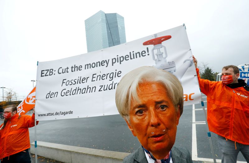 &copy; Reuters. FILE PHOTO: Activists protest against the European Central Bank&apos;s fossil fuel bond buying, Frankfurt, Germany