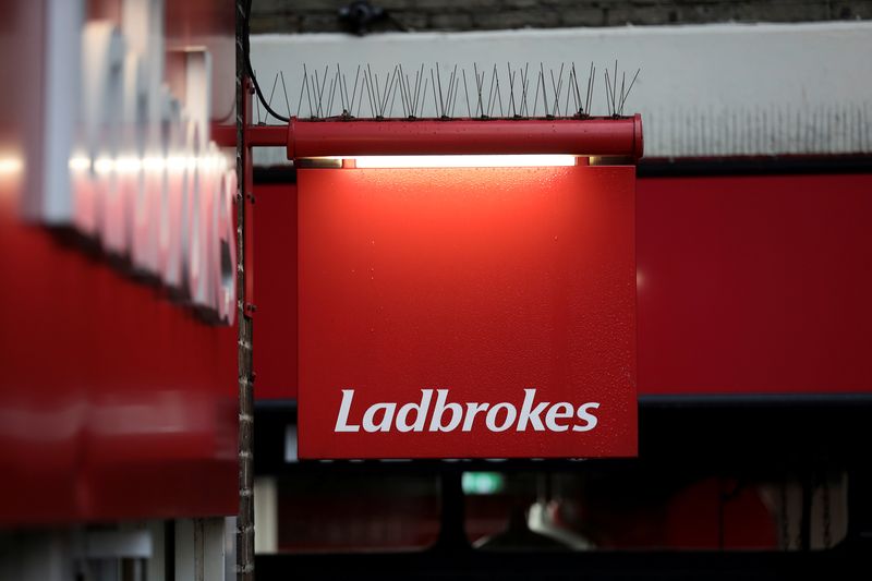 &copy; Reuters. A sign hangs outside a branch of Ladbrokes in London