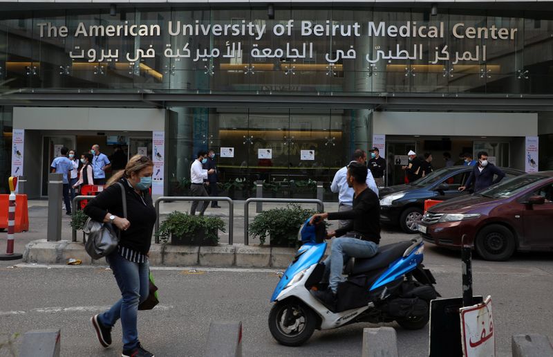 &copy; Reuters. People walk outside the American University of Beirut (AUB) medical centre in Beirut