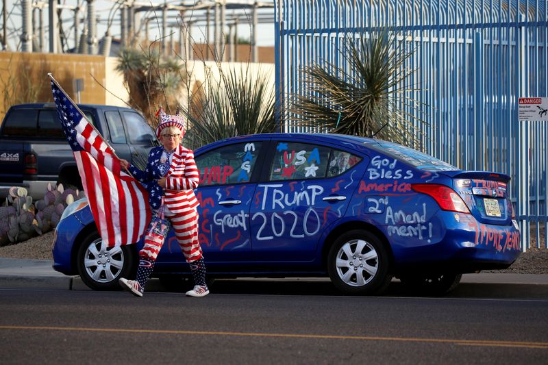 &copy; Reuters. FILE PHOTO: Supporters of U.S. President Donald Trump gather for a &quot;Stop the Steal&quot; protest after the 2020 U.S. presidential election was called for Democratic candidate Biden, at the Maricopa County Tabulation and Election Center (MCTEC), in Ph