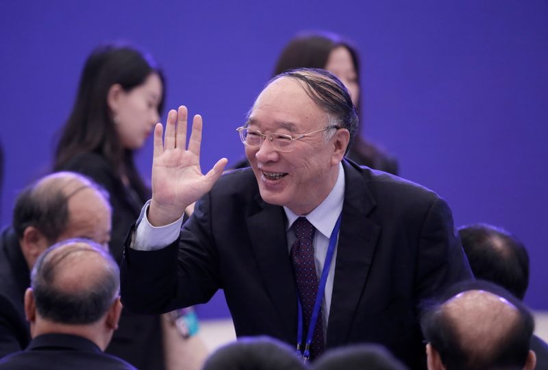 &copy; Reuters. Huang Qifan, Vice Chairman of the China Center for International Economic Exchanges (CCIEE), attends the 2019 New Economy Forum in Beijing