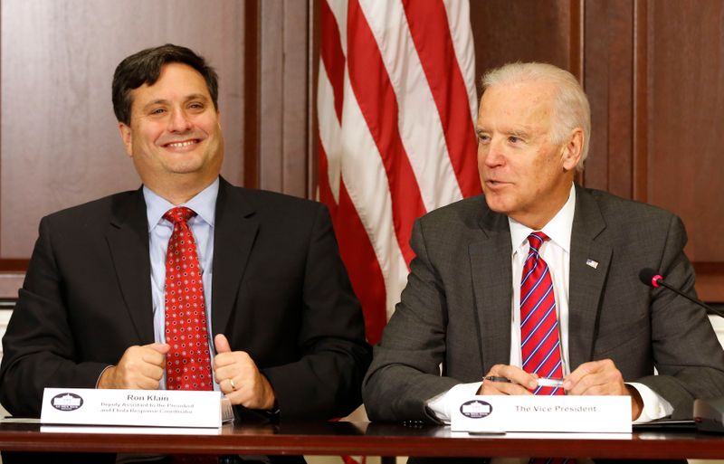 &copy; Reuters. FILE PHOTO: U.S. Vice President Joe Biden is joined by Ebola Response Coordinator Ron Klain while he speaks with organization leaders that are responding to the Ebola crisis, while in the Eisenhower Executive Office Building on the White House complex in 