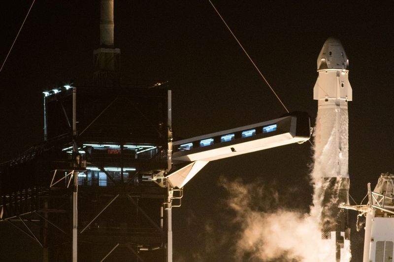 &copy; Reuters. SpaceX Falcon 9 rocket, topped with the Crew Dragon capsule, is launched from Cape Canaveral