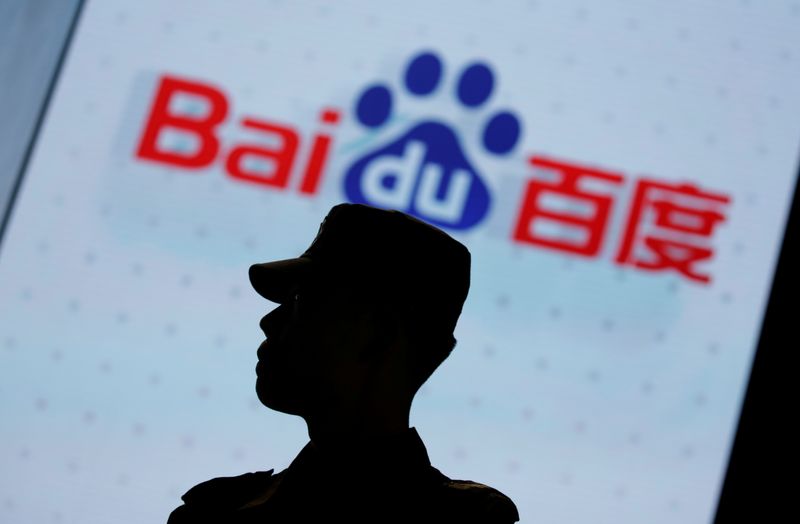 &copy; Reuters. A security personnel stands guard at the opening session of Baidu&apos;s annual AI developers conference in Beijing