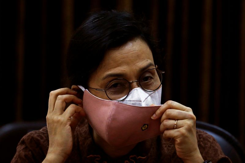 &copy; Reuters. Indonesian Finance Minister Sri Mulyani wears protective masks during an interview with Reuters at the Presidential Palace in Jakarta