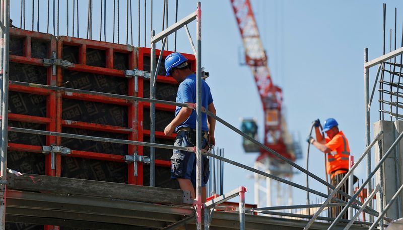 &copy; Reuters. Construction workers prepare concrete formworks in Berlin