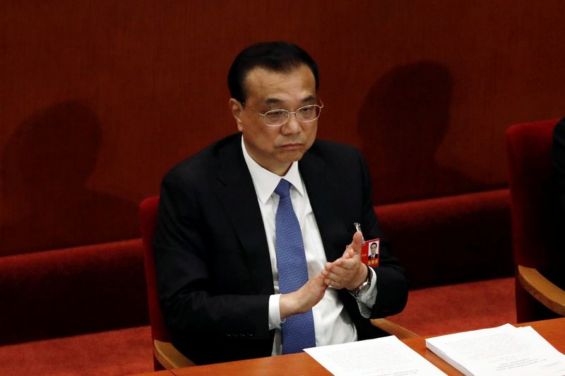 &copy; Reuters. Chinese Premier Li Keqiang attends the closing session of NPC in Beijing