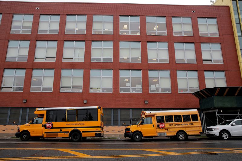 &copy; Reuters. FILE PHOTO: School busses are parked outside a school in Brooklyn, New York