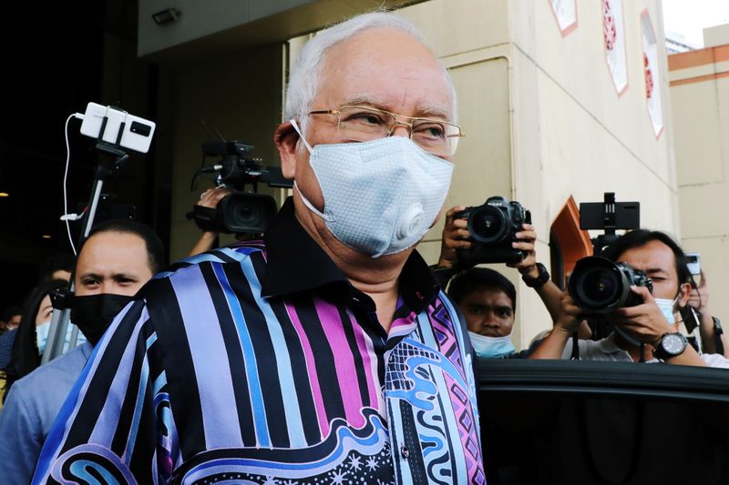 &copy; Reuters. Former Malaysian Prime Minister Najib Razak leaves after a meeting at United Malays National Organization (UMNO) headquarters in Kuala Lumpur