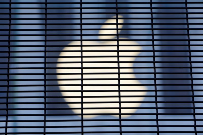&copy; Reuters. The Apple logo is seen through a security fence erected around the Apple Fifth Avenue store