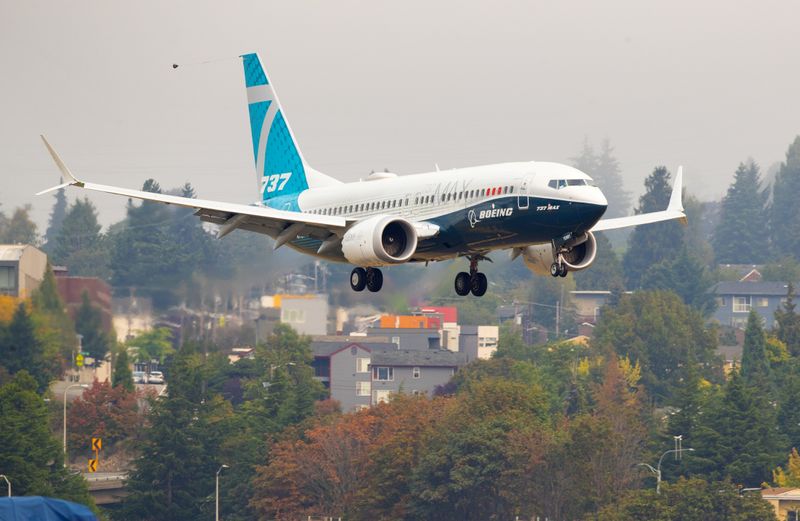 © Reuters. FILE PHOTO: FAA Chief Steve Dickson returns in a Boeing 737 MAX aircraft in Seattle