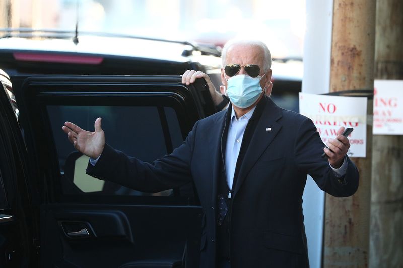 © Reuters. President-elect Biden departs The Queen following a virtual meeting with frontline healthcare workers in Wilmington