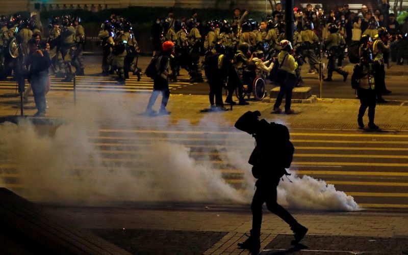 &copy; Reuters. Anti-government demonstrators protest on Christmas Eve in Hong Kong