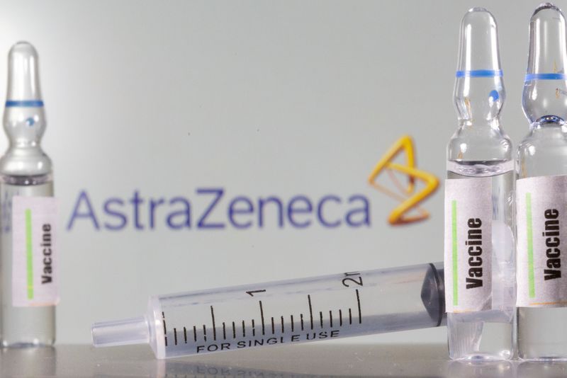 &copy; Reuters. FILE PHOTO: A test tube labelled with the word Vaccine is seen in front of AstraZeneca logo in this illustration