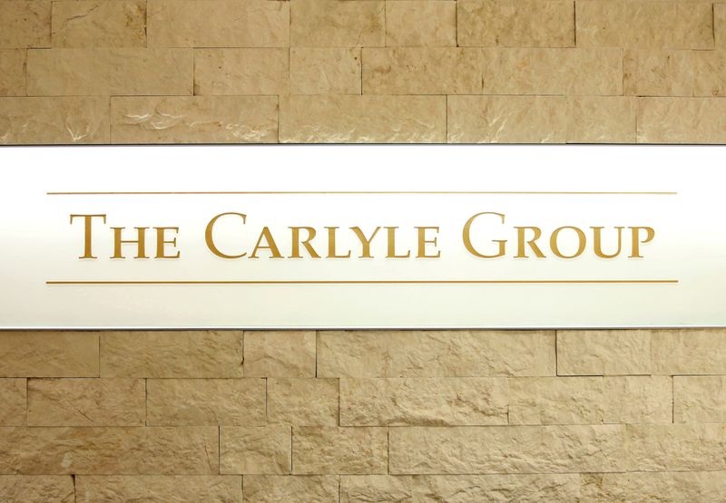 &copy; Reuters. FILE PHOTO: The logo of The Carlyle Group is displayed at the company&apos;s office in Tokyo