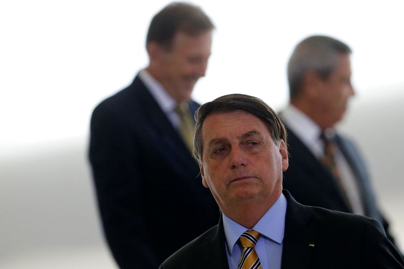 &copy; Reuters. Presidente Jair Bolsonaro antes de cerimônia no Palácio do Planalto