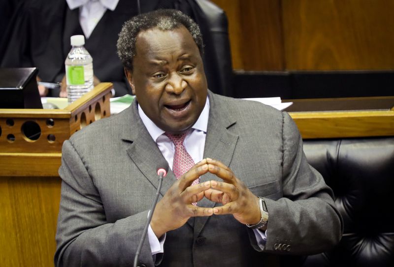 &copy; Reuters. FILE PHOTO: South African Finance Minister Tito Mboweni gestures as he delivers his budget speech at the parliament in Cape Town