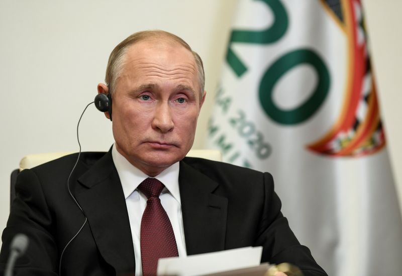 &copy; Reuters. FILE PHOTO: Russian President Vladimir Putin takes part in a video conference during the G20 Leaders&apos; Summit 2020