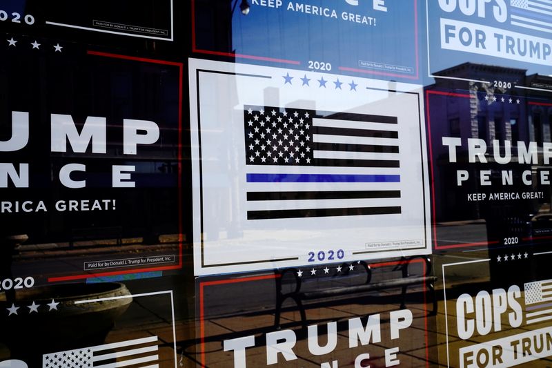 &copy; Reuters. Signs supporting U.S. President Trump and Vice President Pence are displayed in Racine