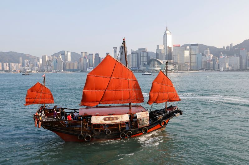 &copy; Reuters. Sailing on traditional wooden tourist junk boat &quot;Dukling&quot; in Hong Kong