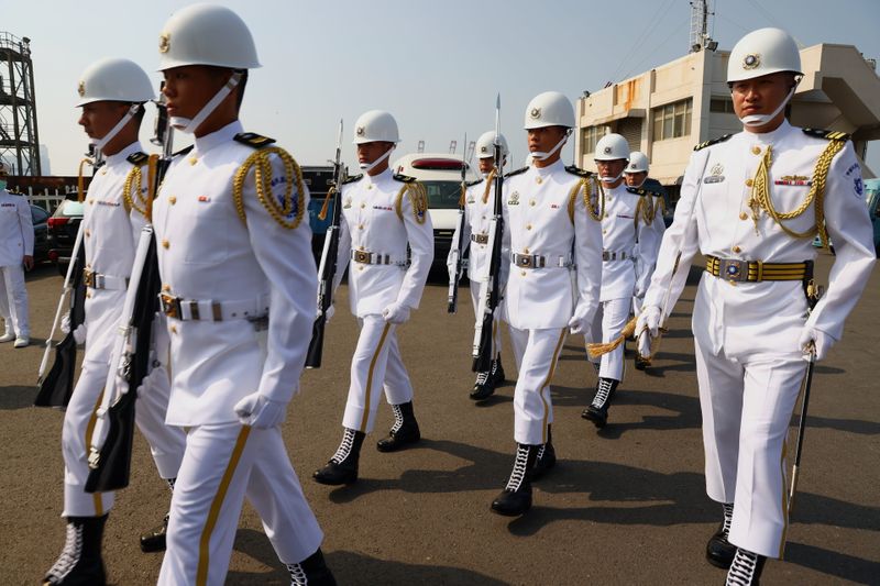 &copy; Reuters. Navy Honor Guards are seen at the ceremony for the start of construction of a new submarine fleet in Kaohsiung,