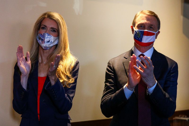 &copy; Reuters. FILE PHOTO: Campaign event for senators David Perdue and Kelly Loeffler in Cumming, Georgia