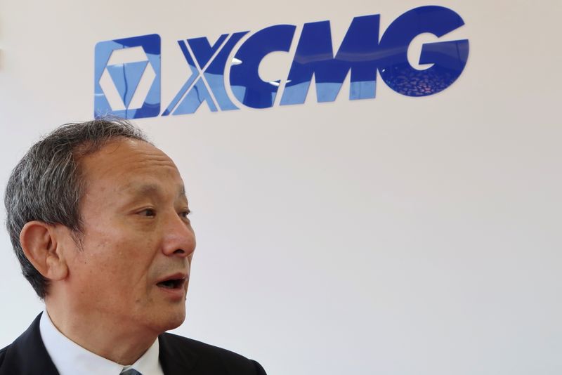 &copy; Reuters. Wang Min, chairman of XCMG Construction Machinery, speaks during an interview with Reuters at the Bauma China trade fair in Shanghai