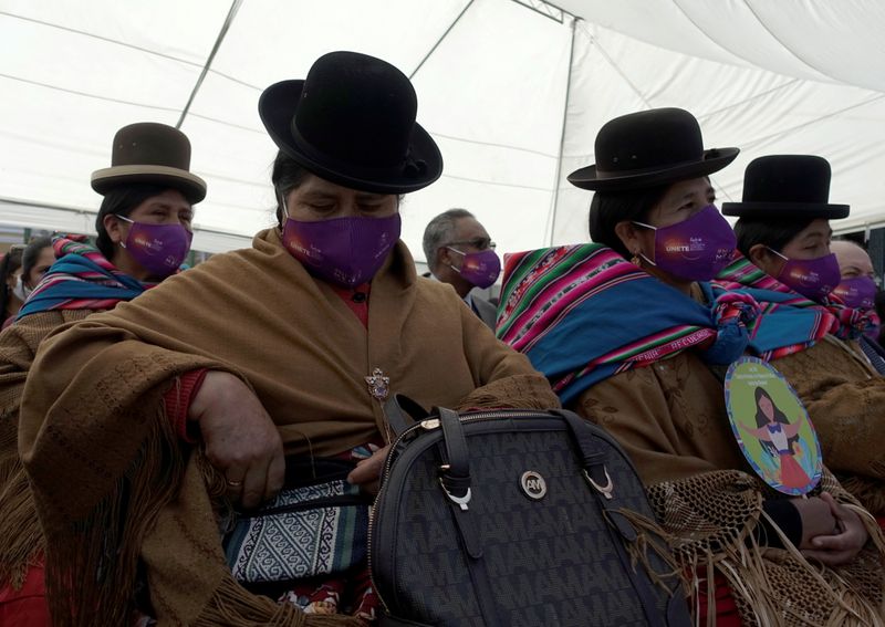 &copy; Reuters. Aymara women attend a rally against femicide and violence against women in La Paz
