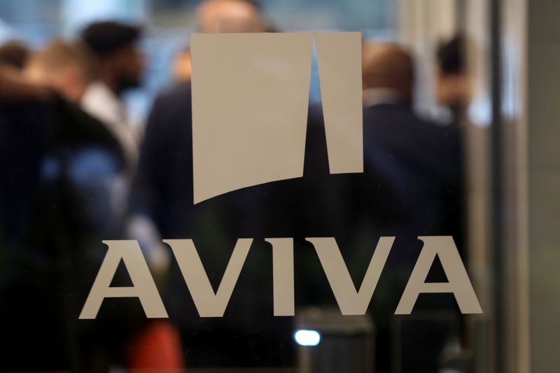 © Reuters. A logo sits on the window of the Aviva head office in the city of London