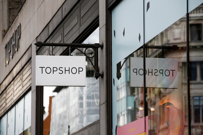 &copy; Reuters. FILE PHOTO: Signage can be seen outside a Topshop and Topman store, owned by Arcadia Group, in central London