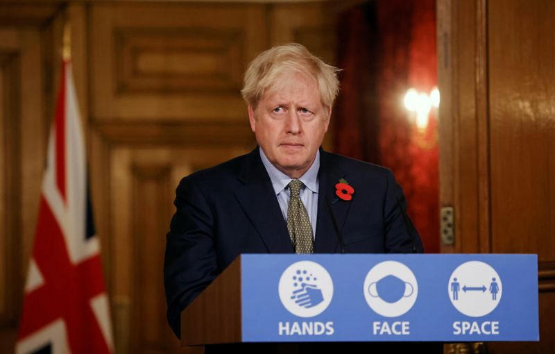 © Reuters. Britain's PM Johnson holds news conference on COVID-19